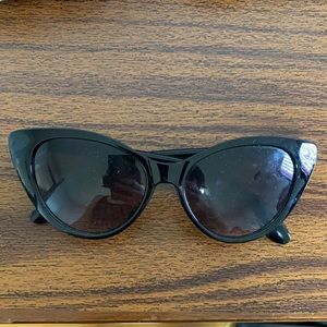 Dark tinted cat eye sunglasses